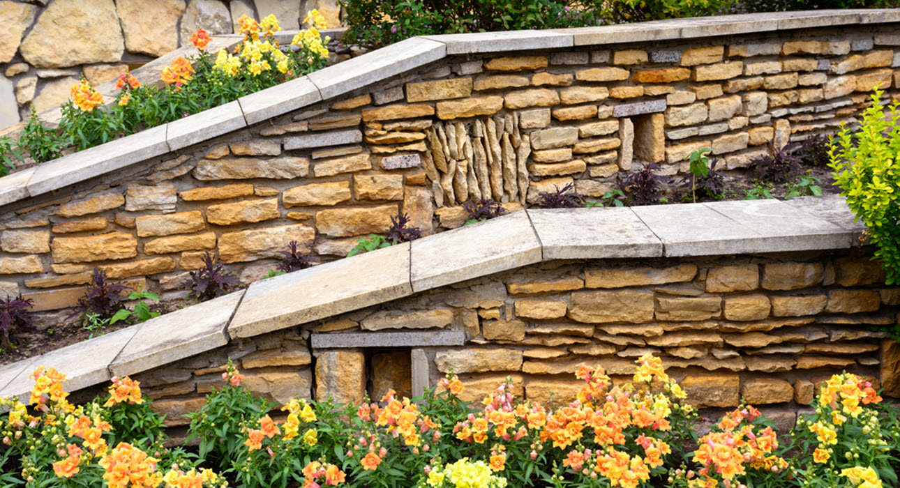 Landscaping with Retaining Walls and Flowerbeds